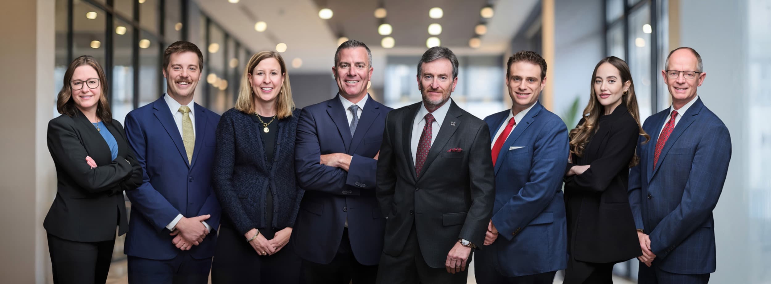 The Taxman & Landy Team at Merrill Lynch, eight wealth management professionals composited into one cohesive group portrait by Henry David Photography