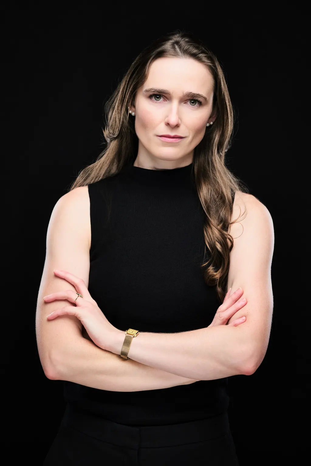 Washington University neurosurgery team member photographed on a black studio background in St. Louis by Henry David Photography